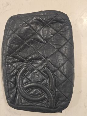 CHANEL Black Quilted Zip Pouch with Logo Jacquard Lining